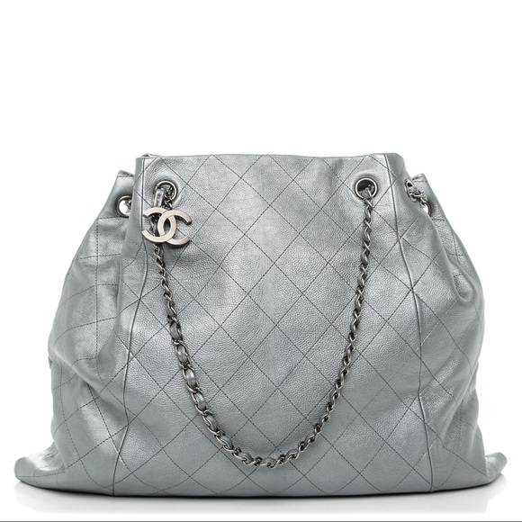 chanel quilted drawstring bag